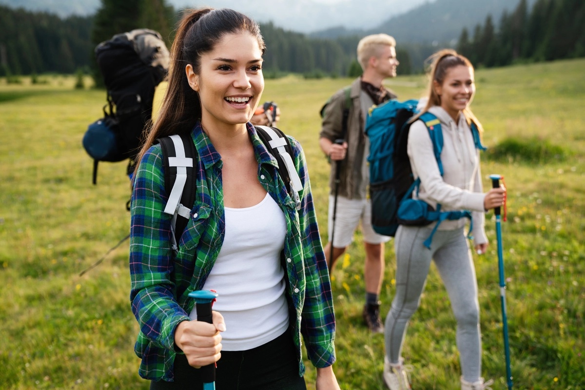 Experiential Therapy: Friends happily hiking outside