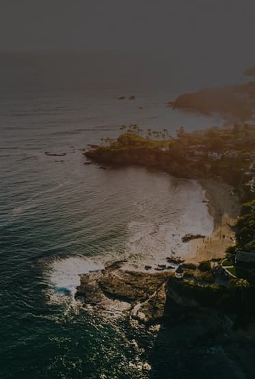 Orange County Rehab: Mental Health and Addiction Treatment Sunset view of palm trees and open fields in Costa Mesa — a calming environment that supports healing and recovery from drug and alcohol addiction.